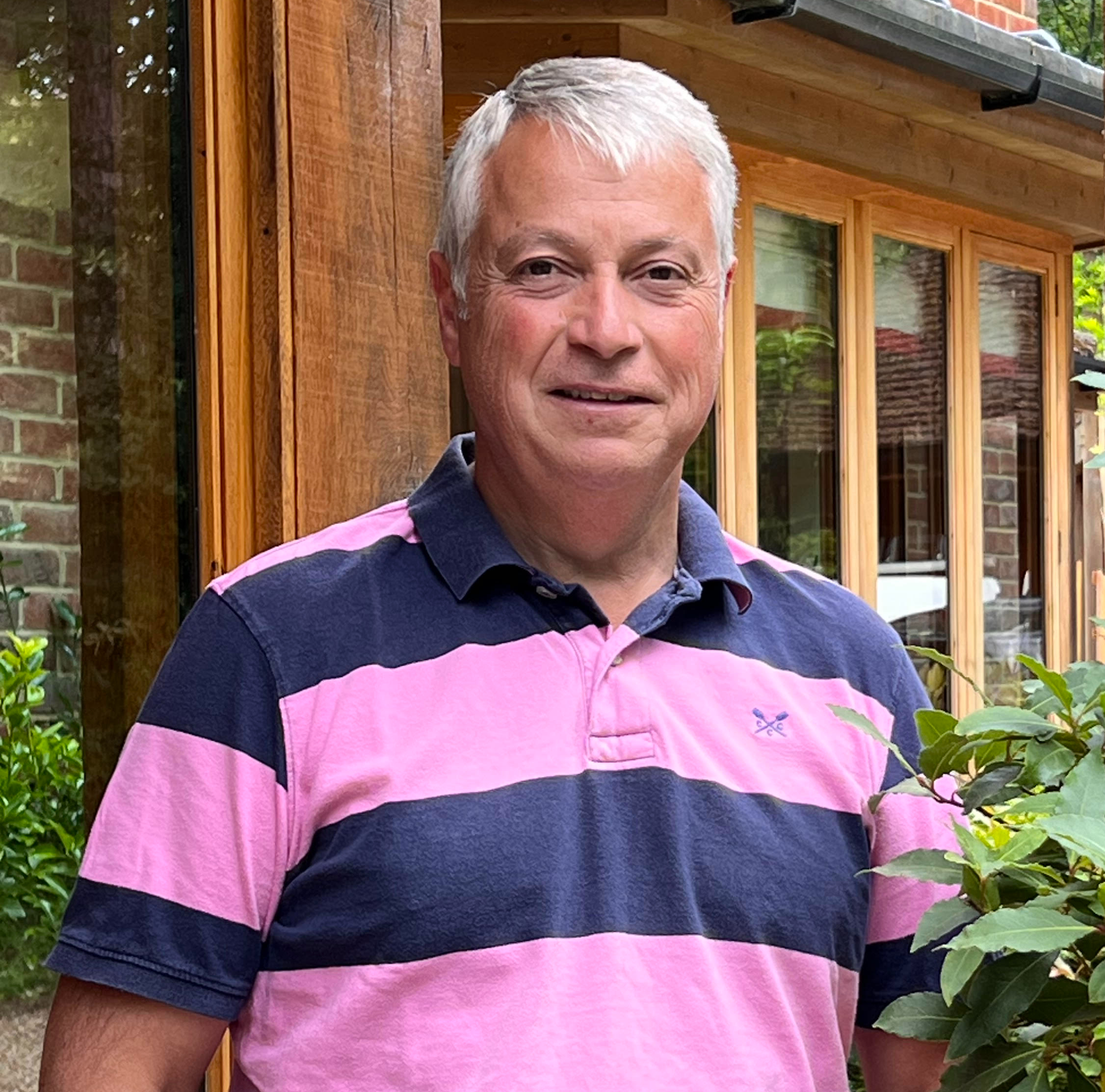 A man smiling into the camera