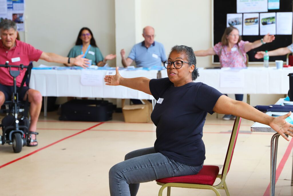 Dixie performing in front of the Parkinson's community