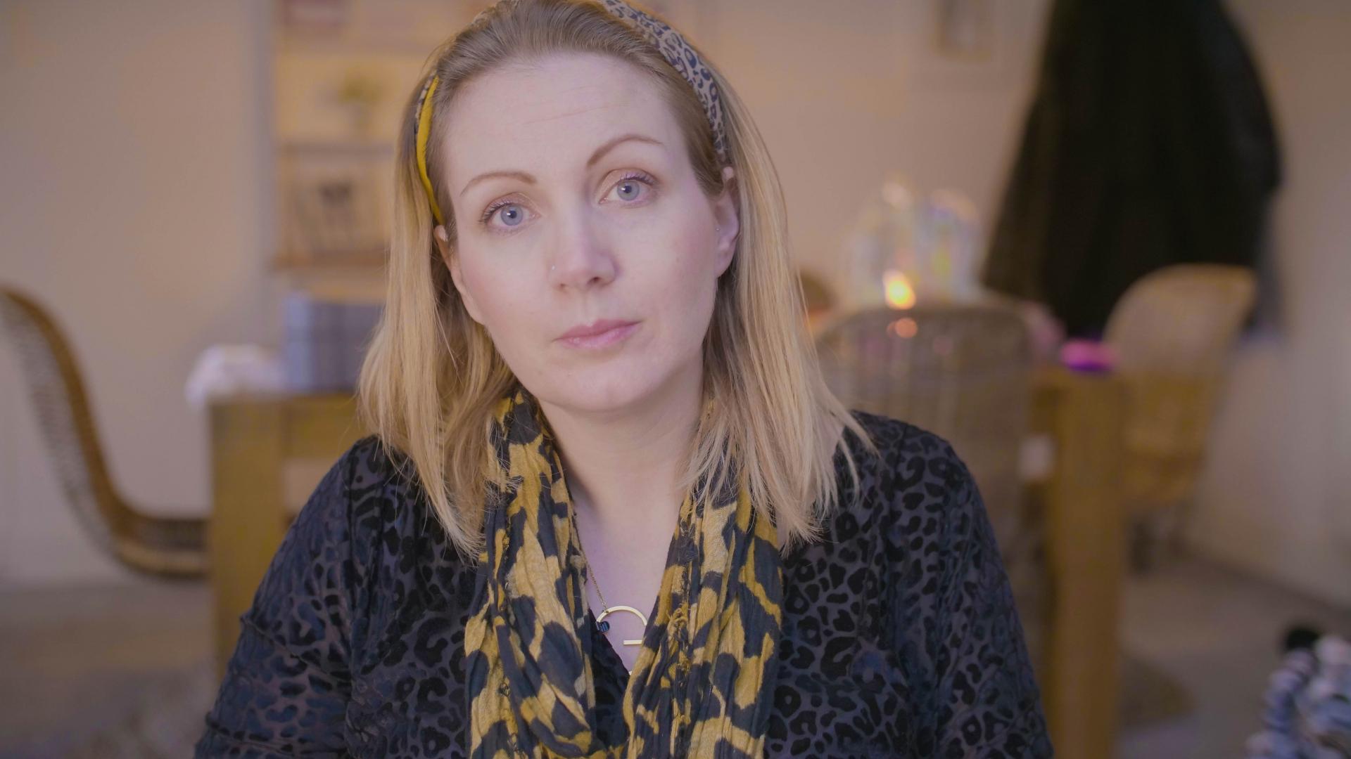 Genna, looking directly at the camera