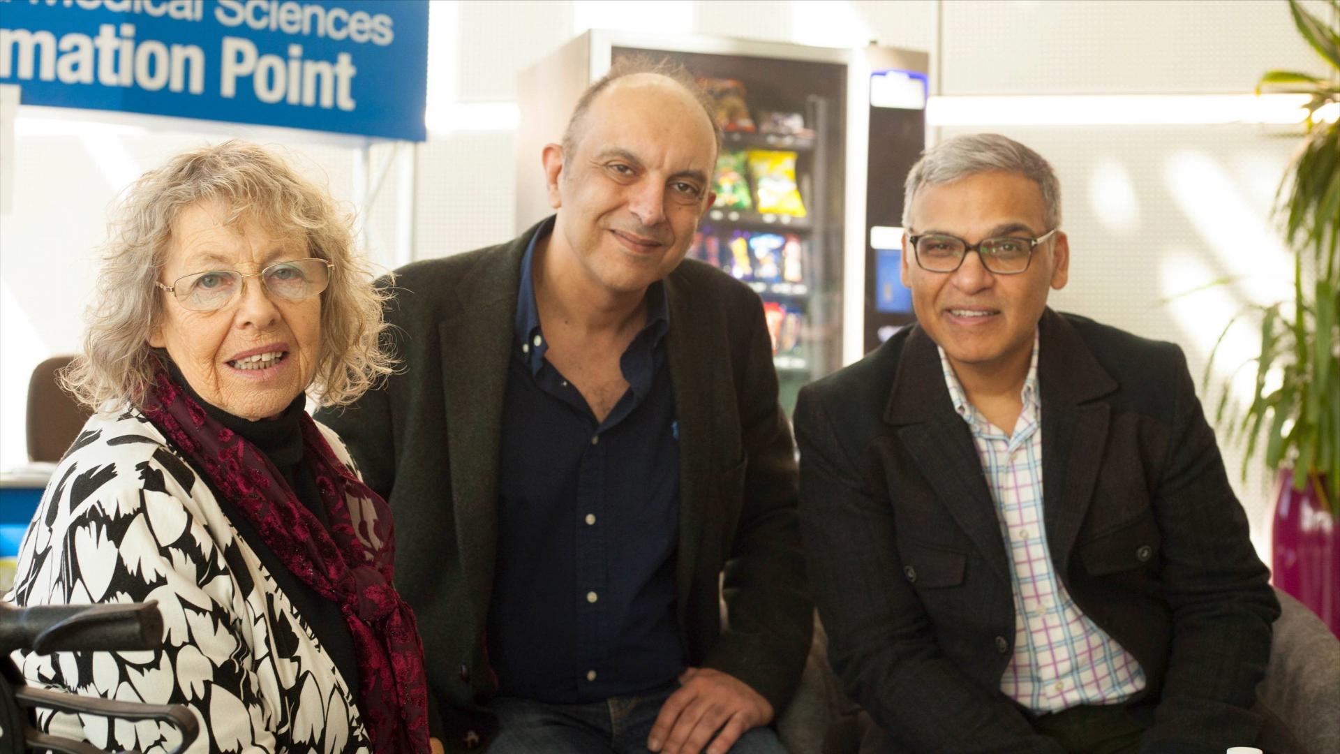 June, who has Parkinson's, with Dr Mohammed Shoaib and Dr Mahmoud Iravan - researchers working on the relationship between nicotine and Parkinson's.