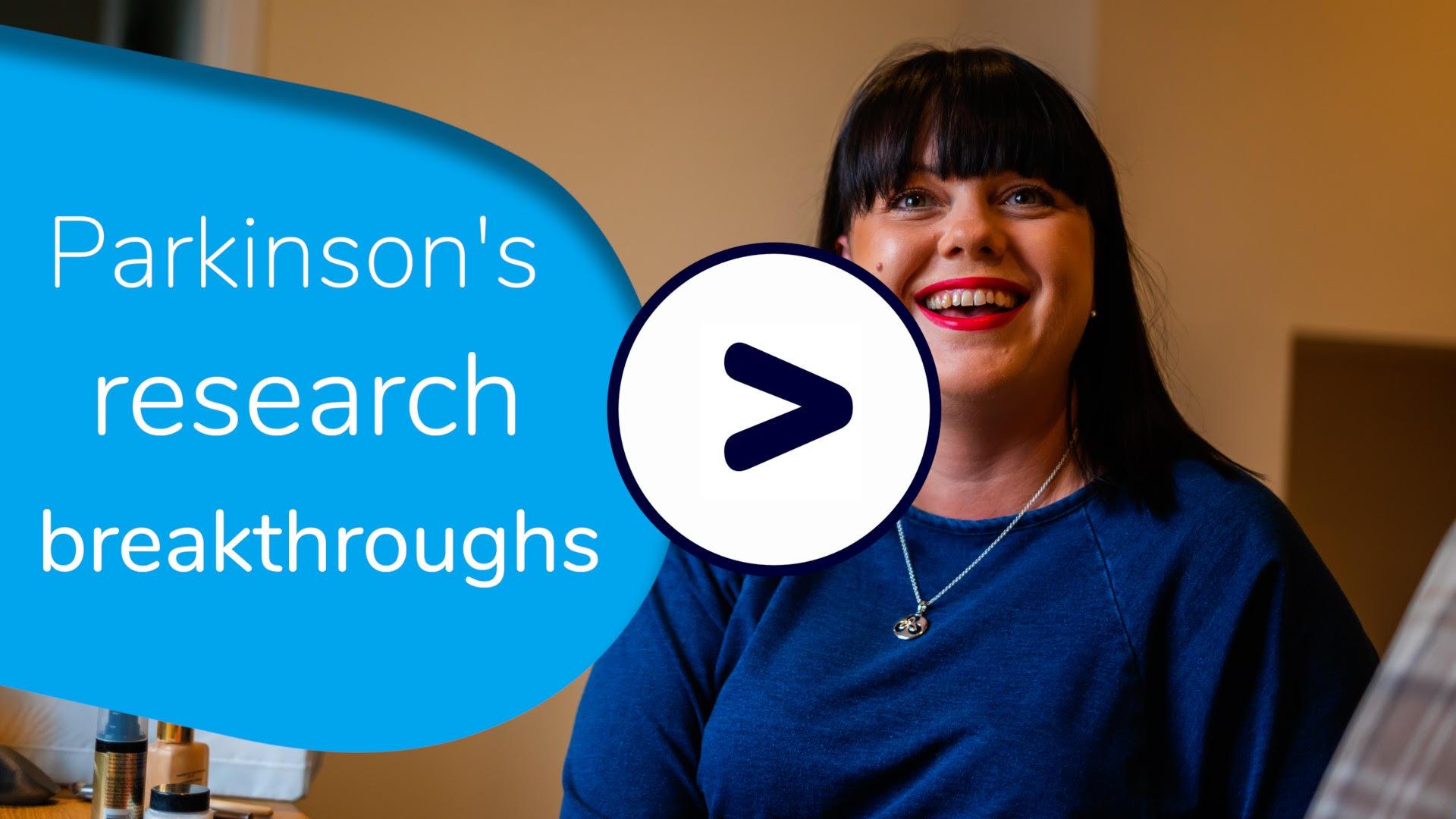 Nicky, a person with Parkinson's, smiling at the camera.