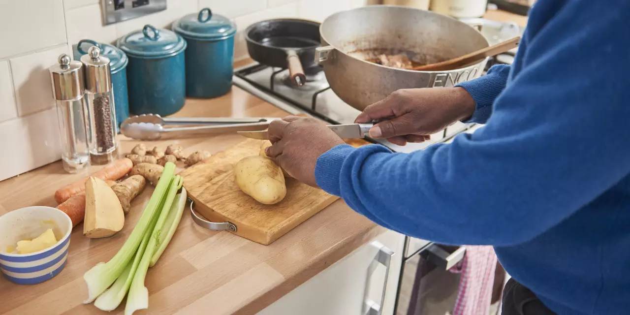 Man chopping vegetables