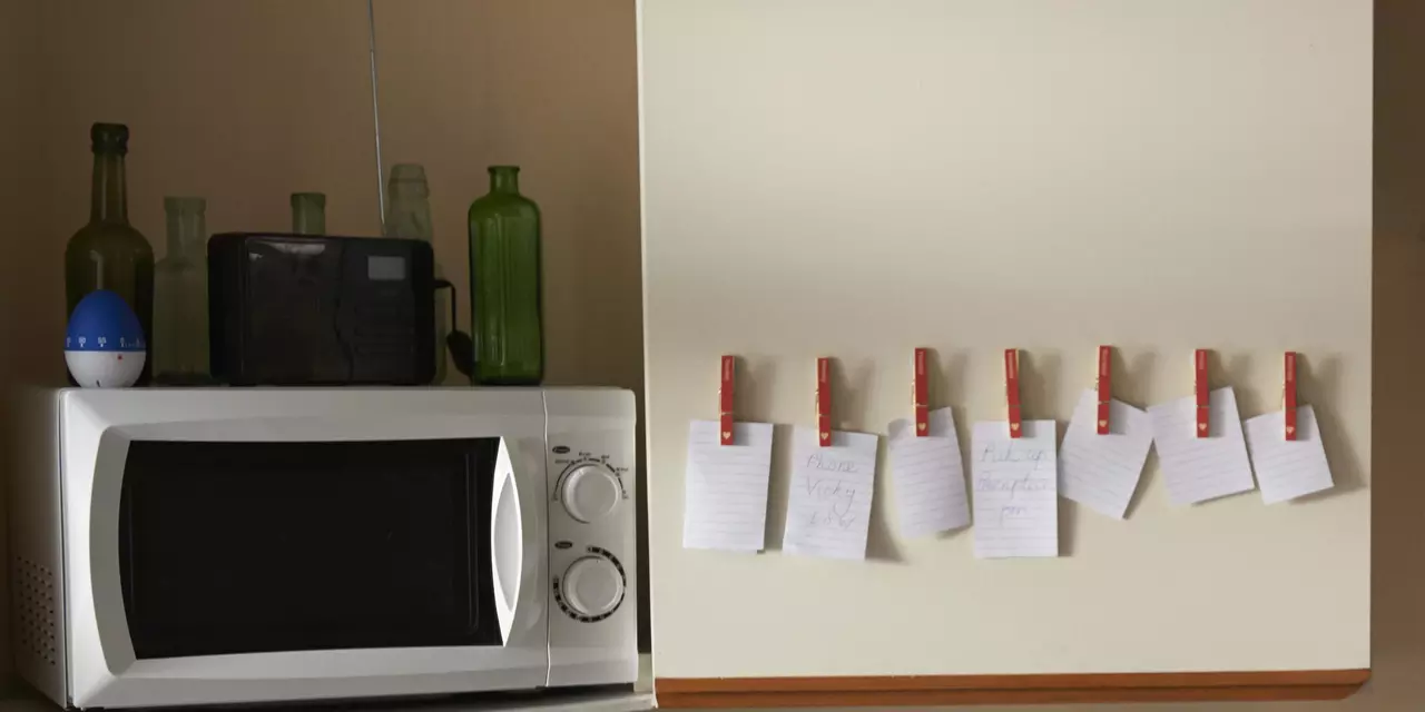 Microwave next to reminder notes
