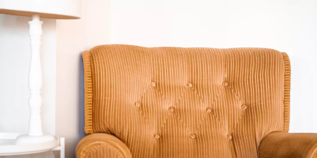 Armchair next to lamp