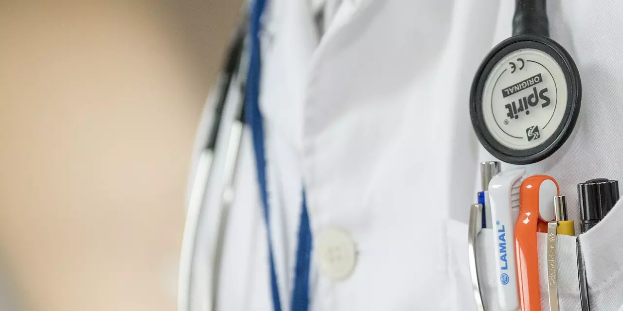 Stethoscope around shoulders