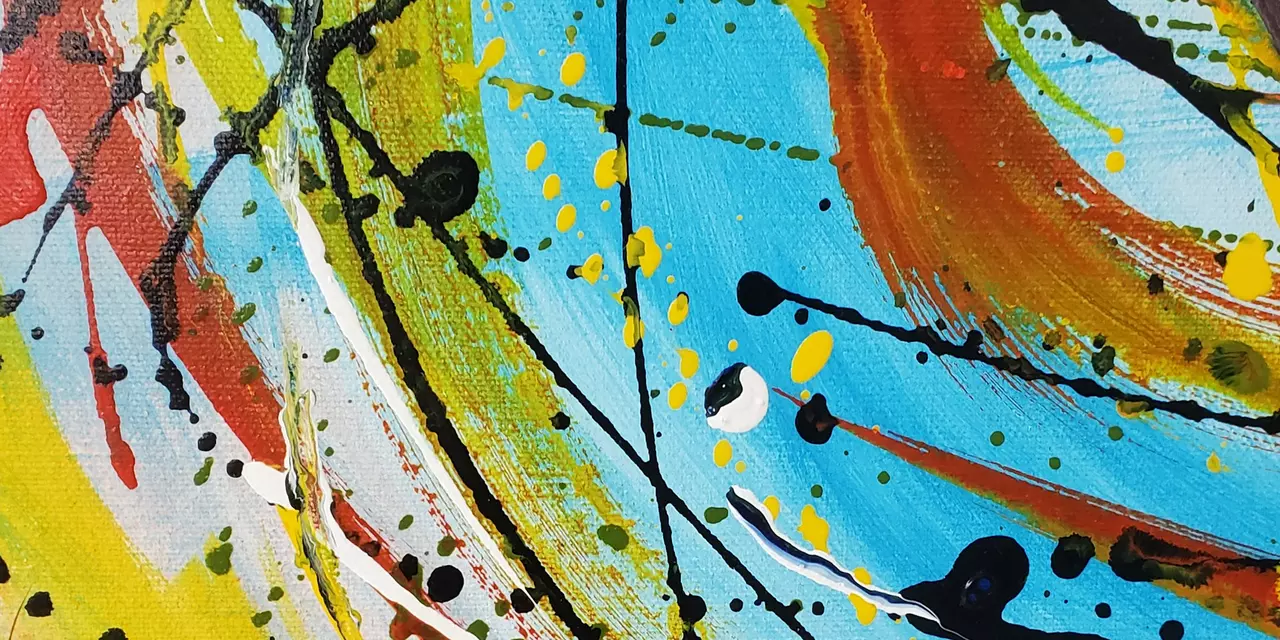 An abstract painting of bright colours and black spots