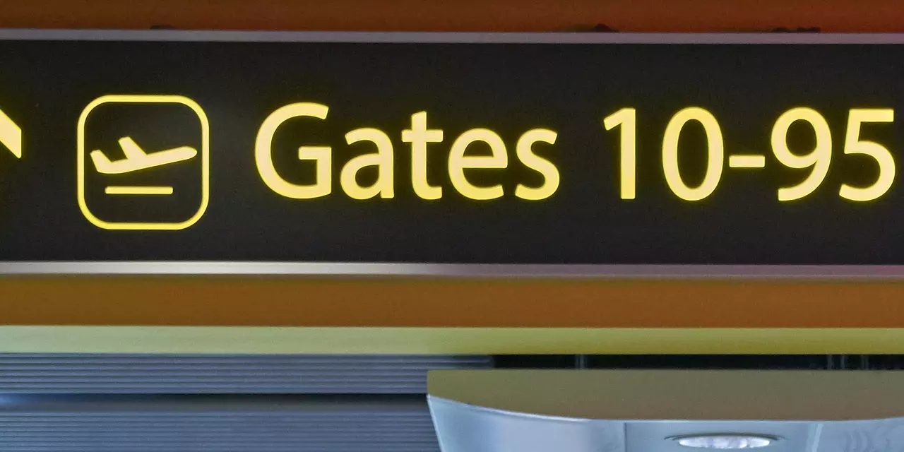 A picture of airport departure gates sign