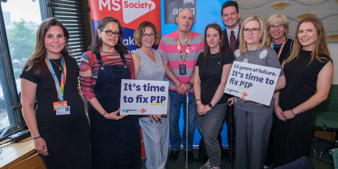 MS Society and Parkinson's UK supporters and staff in Parliament at the joint APPG meeting 