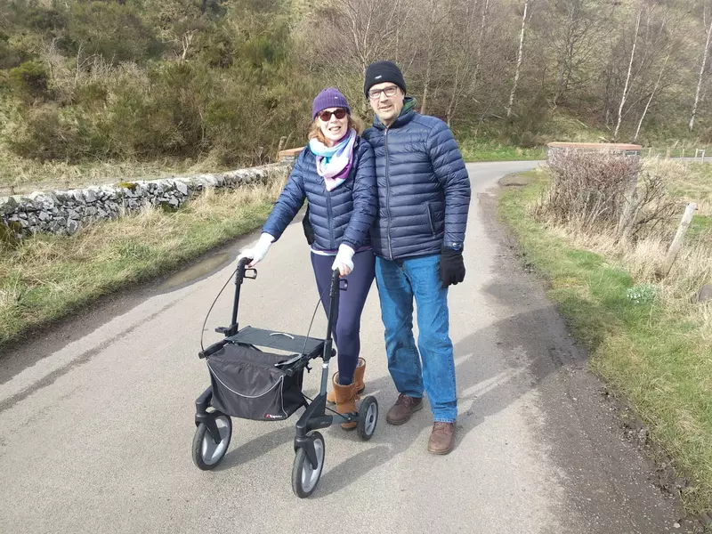 Les and Jo standing together on a walk