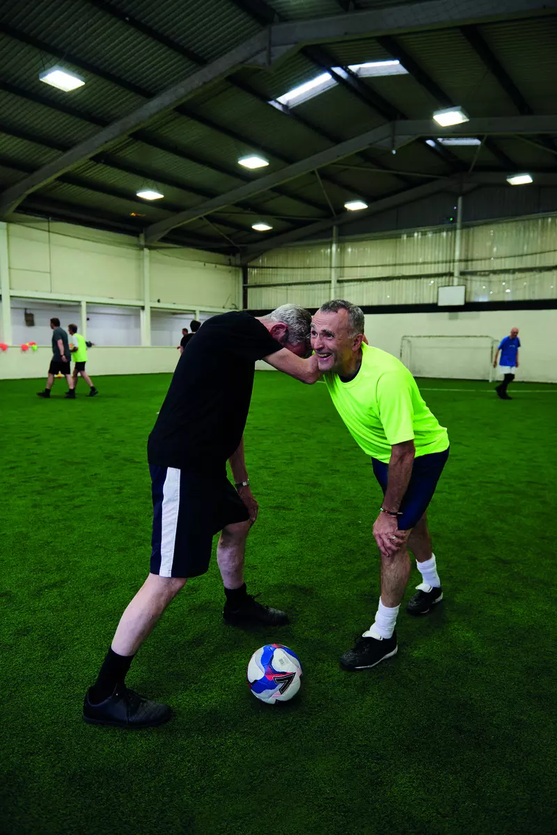 John stretching with another player