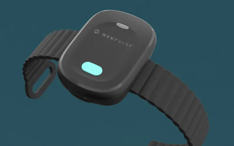 The Neupulse device, a black wrist-worn device with a blue button on the top.