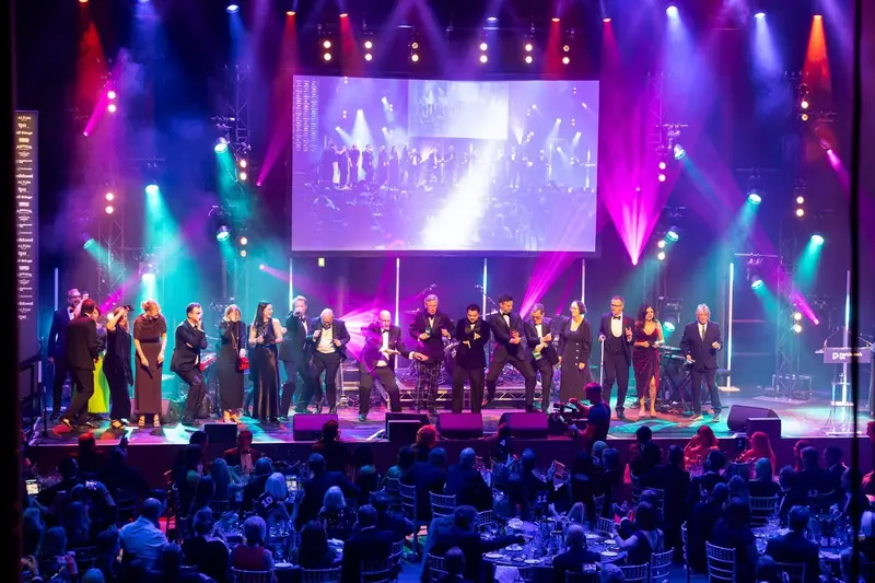 Performers on stage at Parkinson's UK Presents: a night at the Roundhouse in 2025.